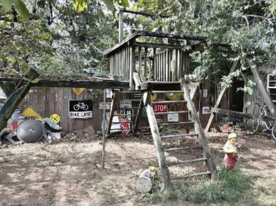 Before: an old wooden play set in a backyard